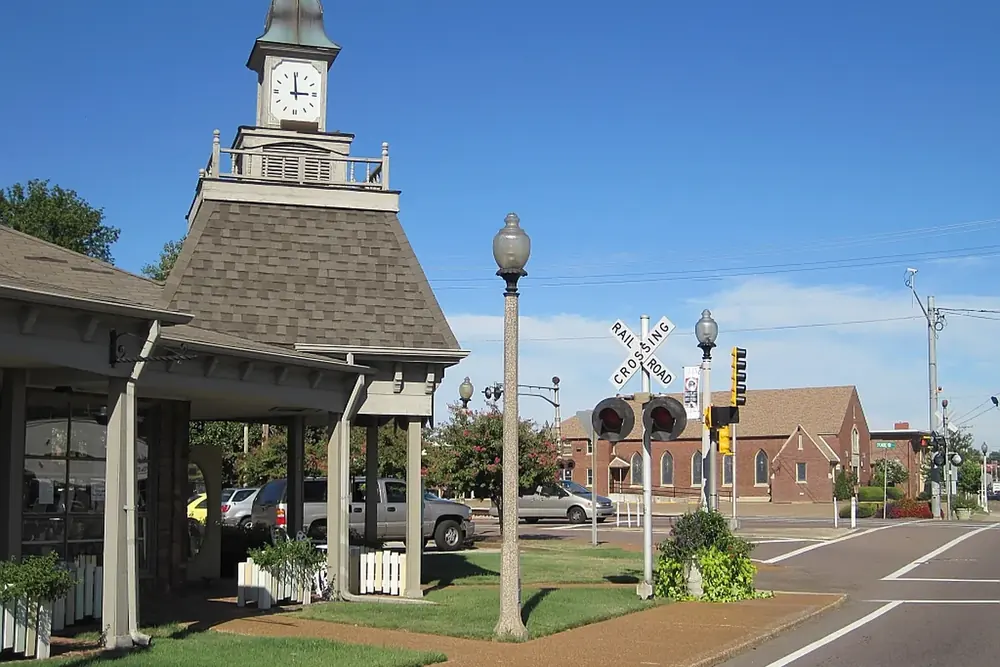 Clock tower pavilion and railroad crossing at the historic town square in Bartlett, Tennessee