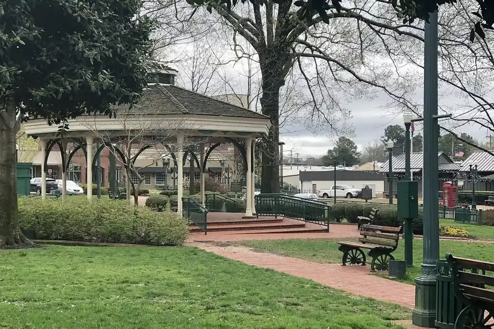 The white gazebo and a brick walk on the historic town square in Collierville, Tennessee